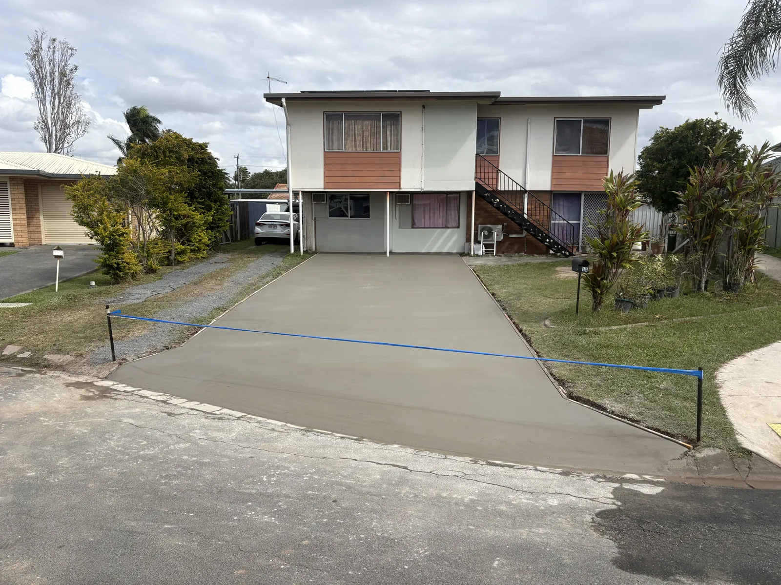 Residential concrete driveway installation in Mackay