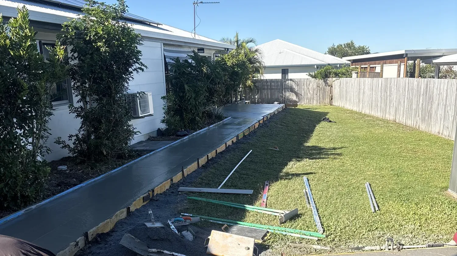 Residential backyard path concreting project by Great Australian Concrete