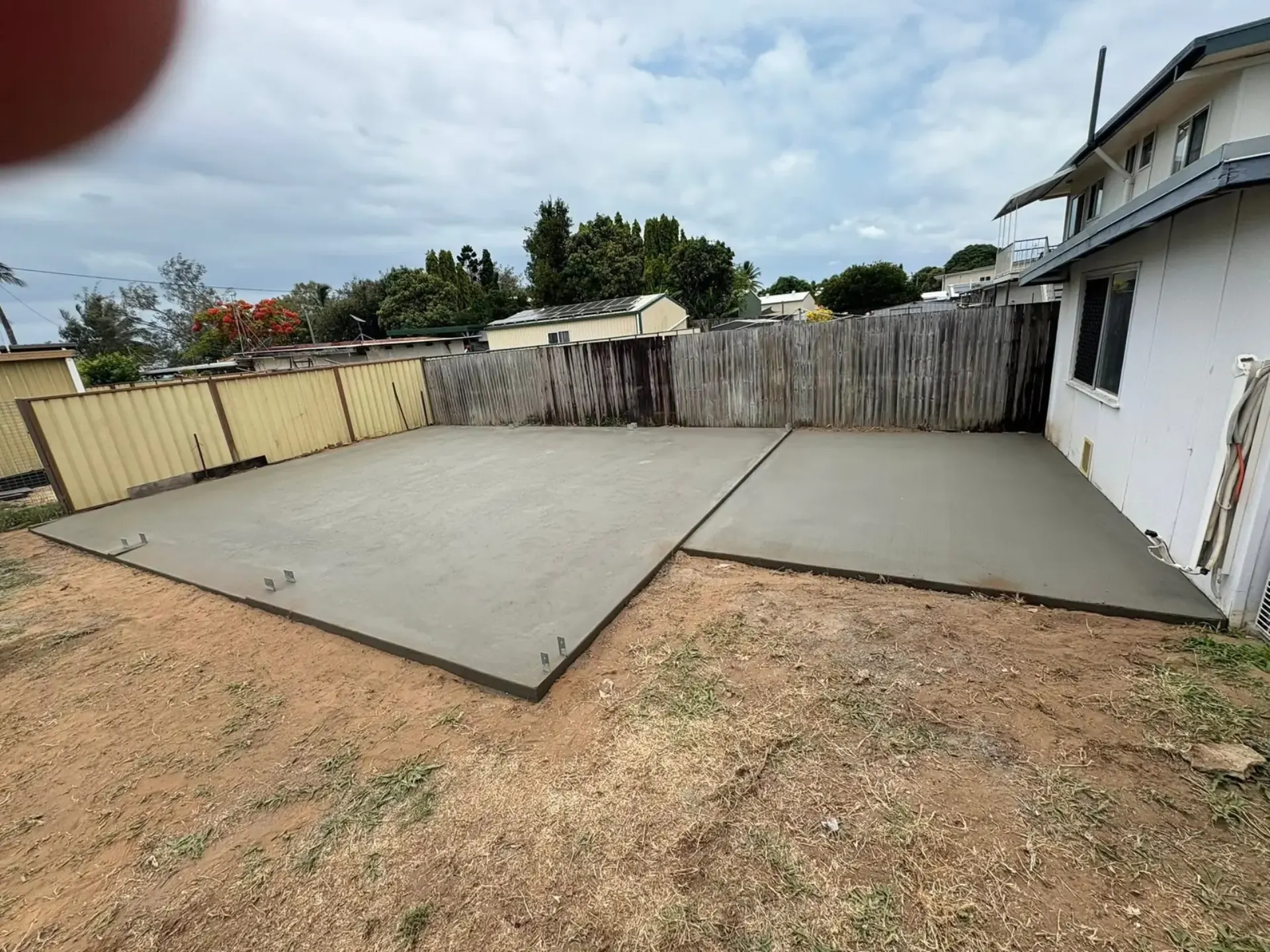 Residential backyard slab concreting project by Great Australian Concrete