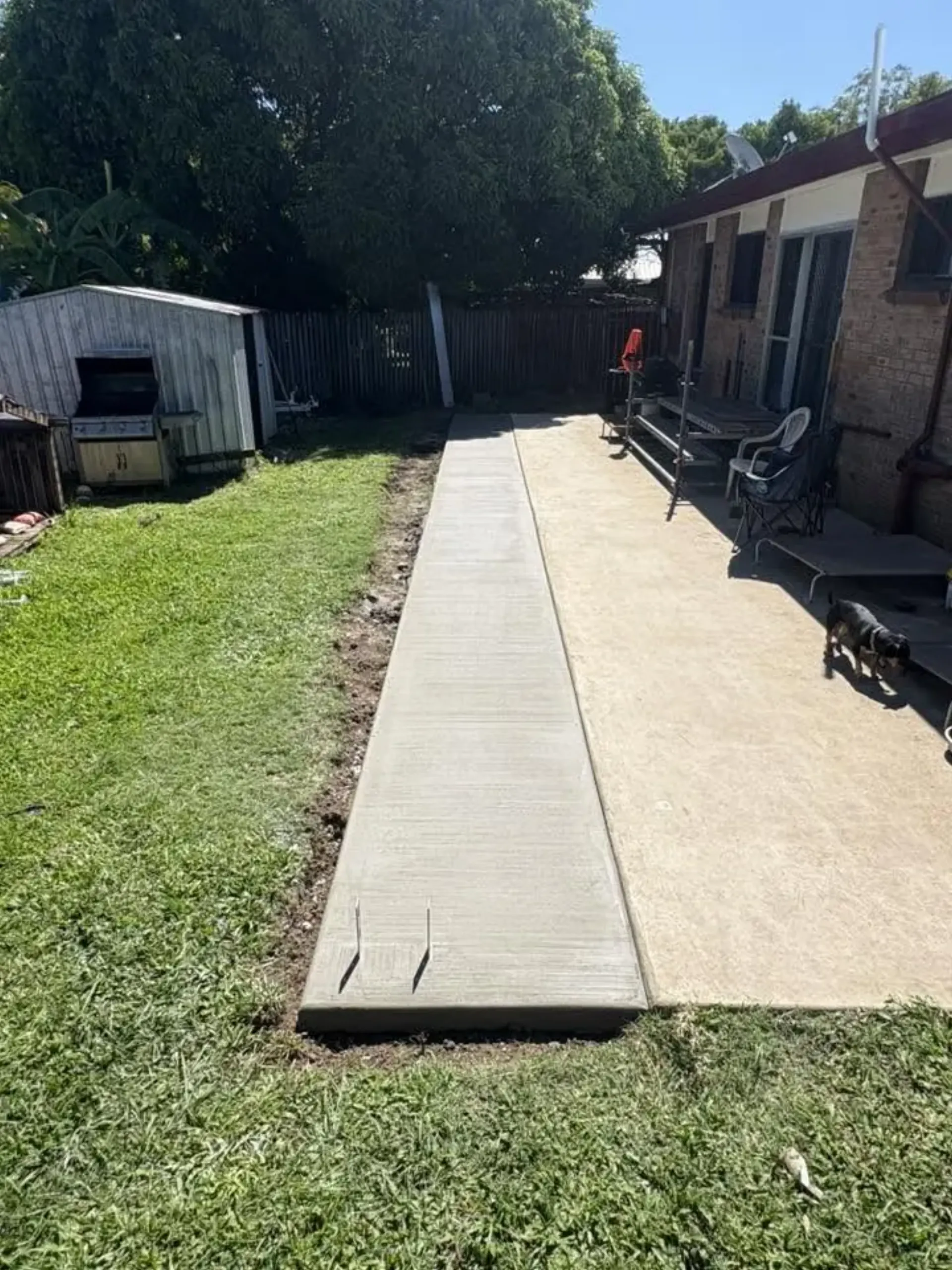 Residential backyard path concreting project by Great Australian Concrete